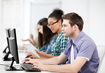 Image showing students with computers studying at school