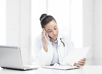 Image showing female doctor with laptop pc