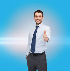 Image showing handsome businessman showing thumbs up