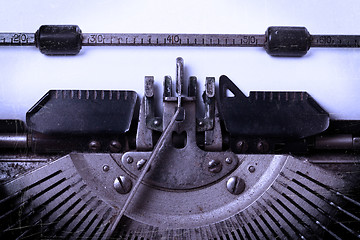 Image showing Old typewriter with paper