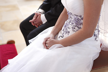 Image showing Hands of a bride and groom