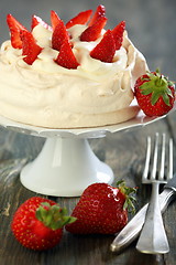 Image showing Meringue with whipped cream and strawberries.