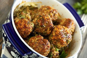 Image showing Meatballs in a pan closeup.