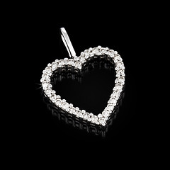 Image showing White gold pendant with diamonds in shape of heart