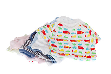 Image showing Pile of baby clothes isolated on white 