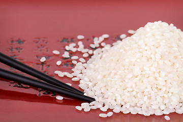 Image showing Rice and chopsticks on a plate