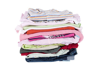 Image showing Pile of baby clothes isolated on white 