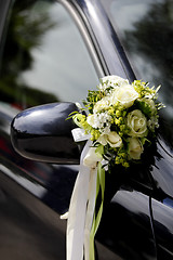 Image showing Flower decoration wedding car