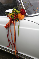 Image showing Flower decoration wedding car