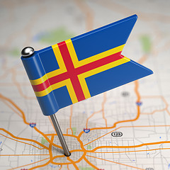 Image showing Aland Islands Small Flag on a Map Background.