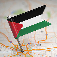 Image showing Palestine Small Flag on a Map Background.