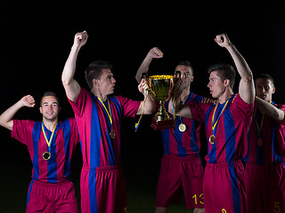 Image showing soccer players celebrating victory