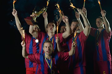 Image showing soccer players celebrating victory