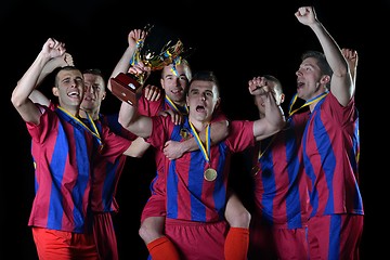 Image showing soccer players celebrating victory