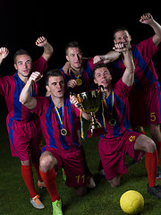 Image showing soccer players celebrating victory