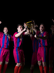 Image showing soccer players celebrating victory