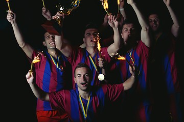 Image showing soccer players celebrating victory