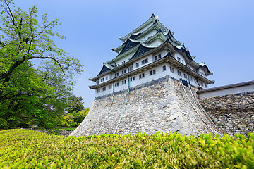 Image showing Nagoya castle atop with golden tiger fish head pair called 