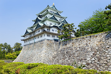 Image showing Nagoya castle atop with golden tiger fish head pair called 