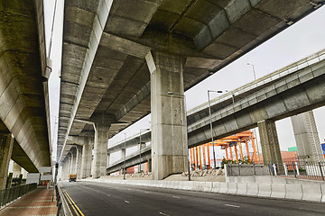 Image showing Empty asphalt road under the new expressway line. 