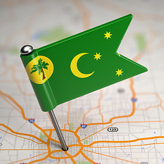 Image showing Cocos (Keeling) Islands Small Flag on a Map Background.