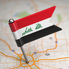 Image showing Iraq Small Flag on a Map Background.