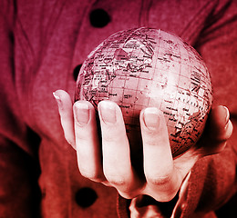 Image showing Globe in a girl's hands