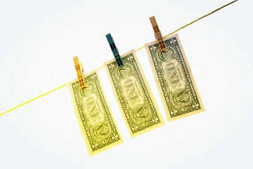 Image showing Dollars on the wire