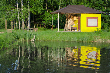 Image showing relaxation bathhouse at country pond summer time 