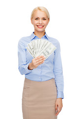 Image showing young businesswoman with dollar cash money