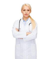 Image showing serious female doctor with stethoscope