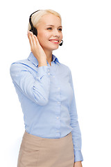 Image showing friendly female helpline operator