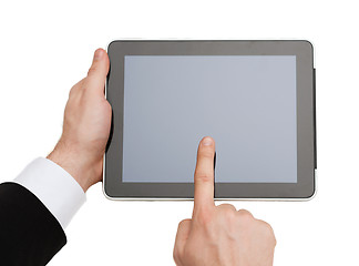 Image showing close up of man hands touching tablet pc