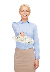 Image showing young businesswoman with dollar cash money