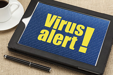 Image showing virus alert on digital tablet