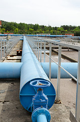 Image showing stopcock tap pipes oxygen blow dirty bubble water 