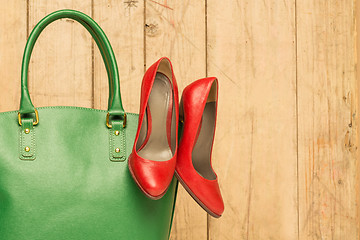 Image showing Woman accessories on wood background