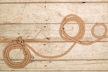 Image showing Ropes on a wooden background