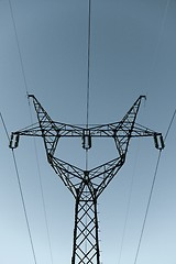 Image showing High Voltage Post against blue sky