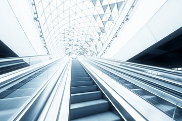 Image showing Moving escalator in the business center