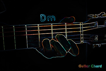 Image showing Guitar chord on a dark background