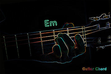 Image showing Guitar chord on a dark background