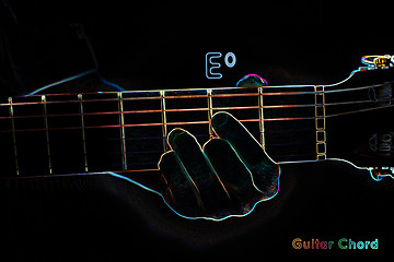 Image showing Guitar chord on a dark background