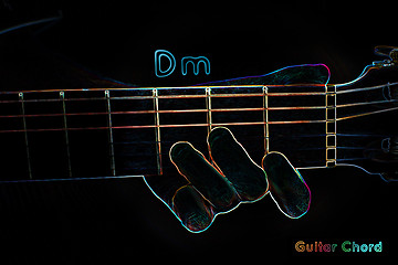 Image showing Guitar chord on a dark background