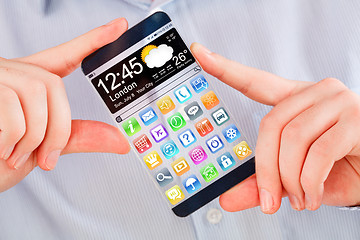 Image showing Smartphone with transparent screen in human hands.