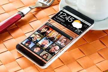 Image showing Smartphone with a transparent display.