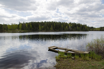 Image showing Water filled rowing boat