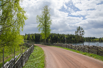 Image showing Old gravel road by the lake