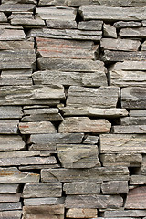 Image showing Stone wall constructed from raw stones