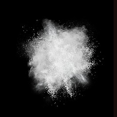 Image showing White powder explosion isolated on black background